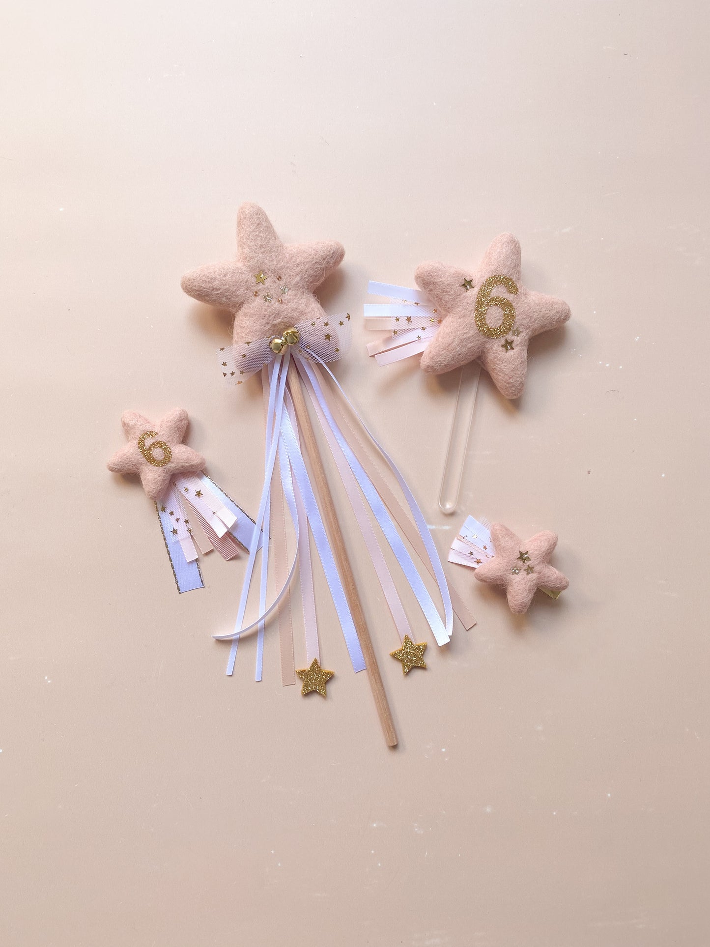 a bundle of birthday accessories with pink star