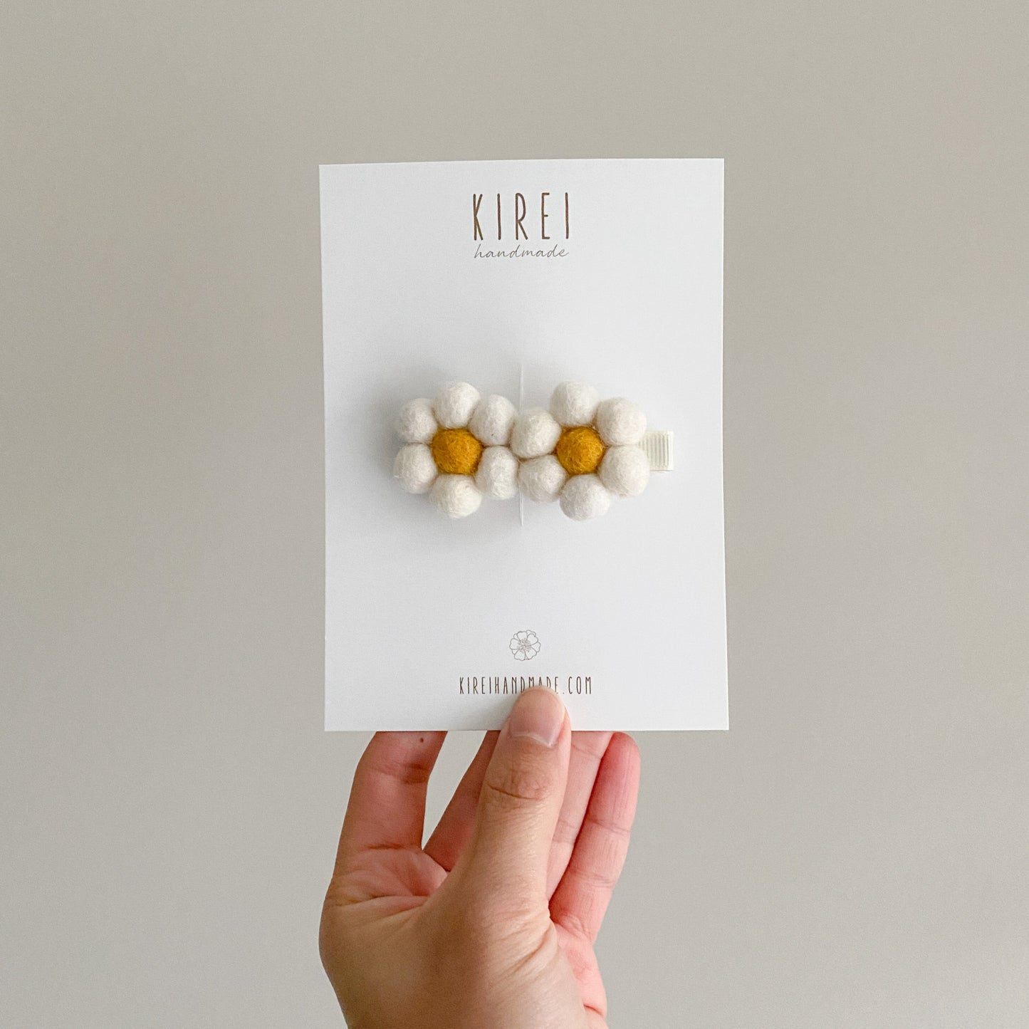 pom pom daisy hair clip