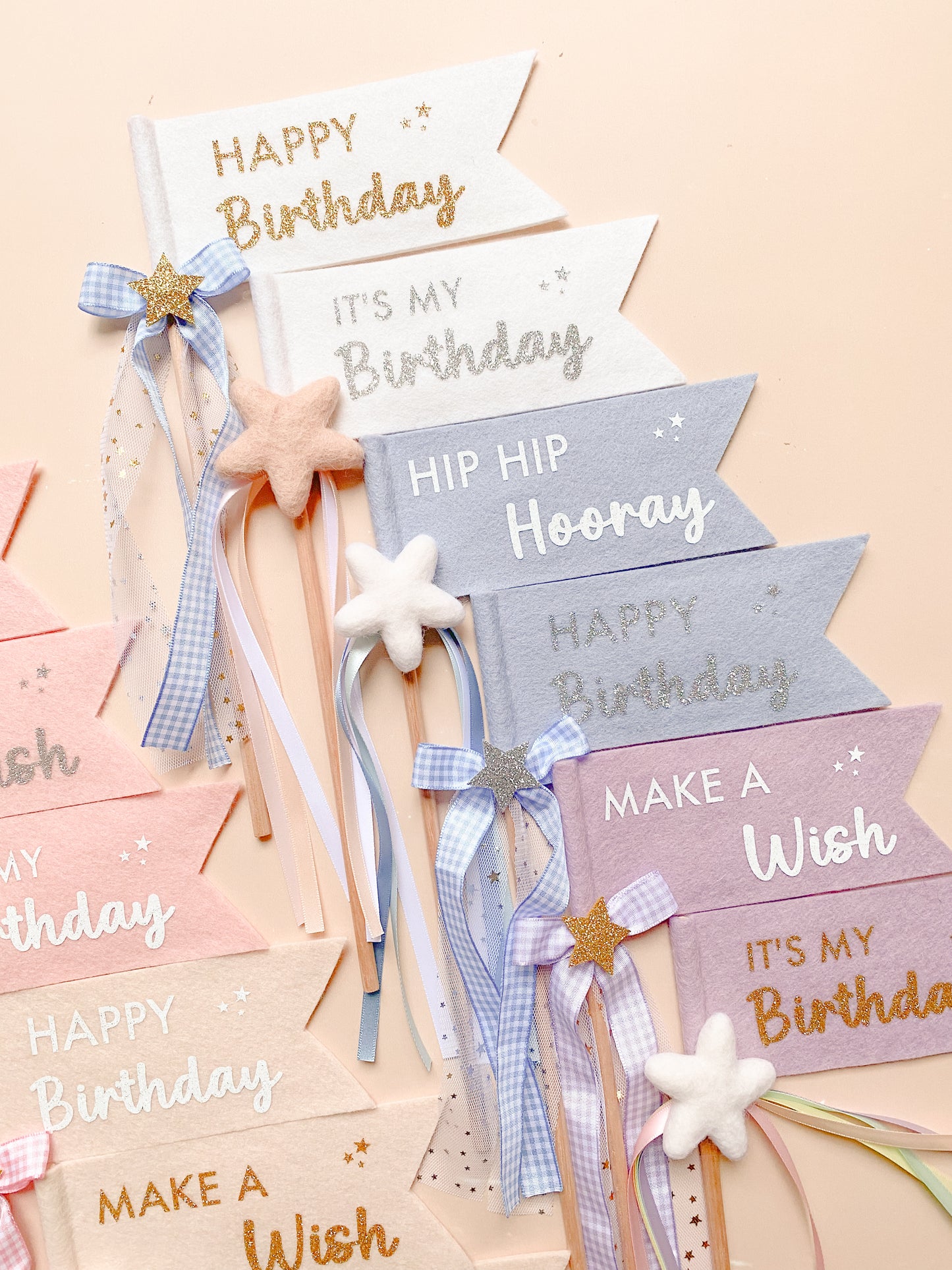 Decorative birthday banners with ribbons and stars