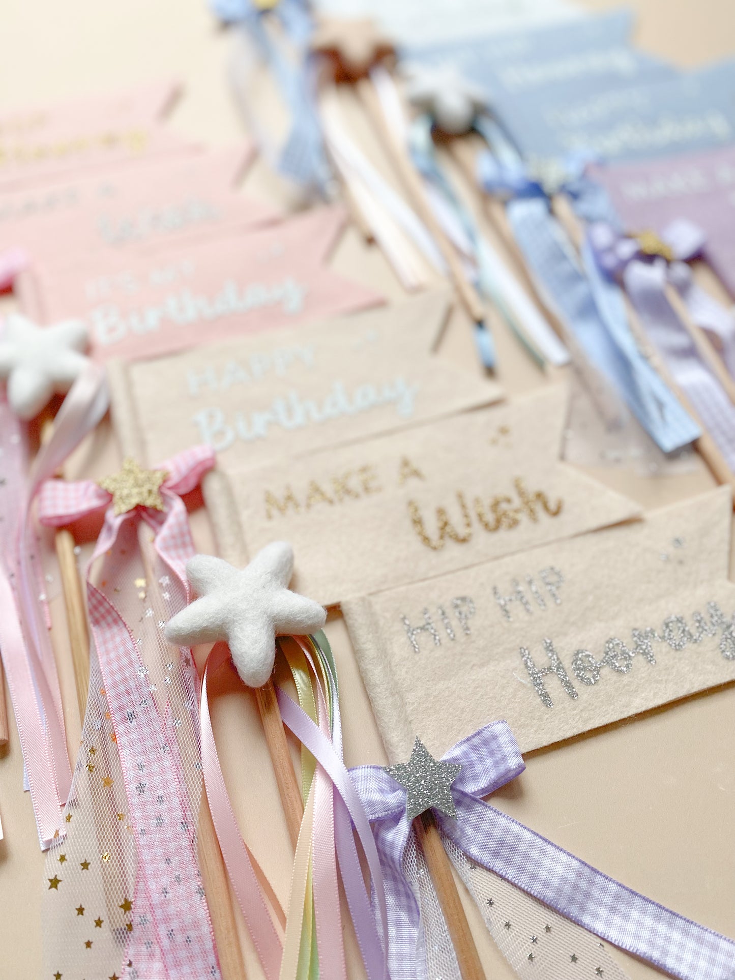 Decorative birthday banners with ribbons and stars