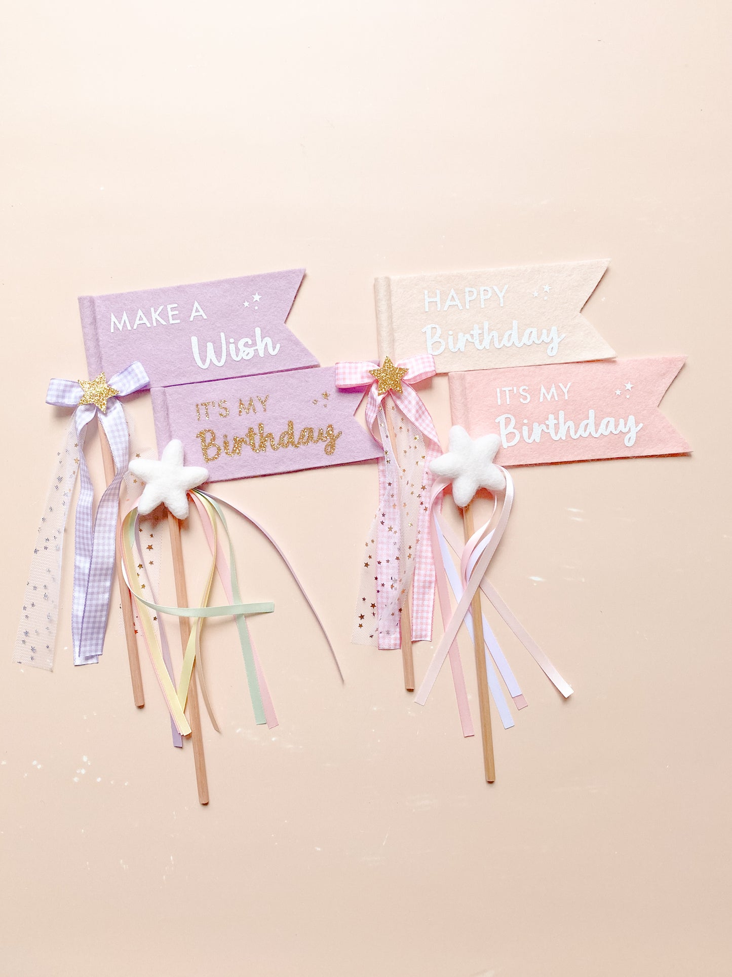 Decorative birthday banners with ribbons and stars