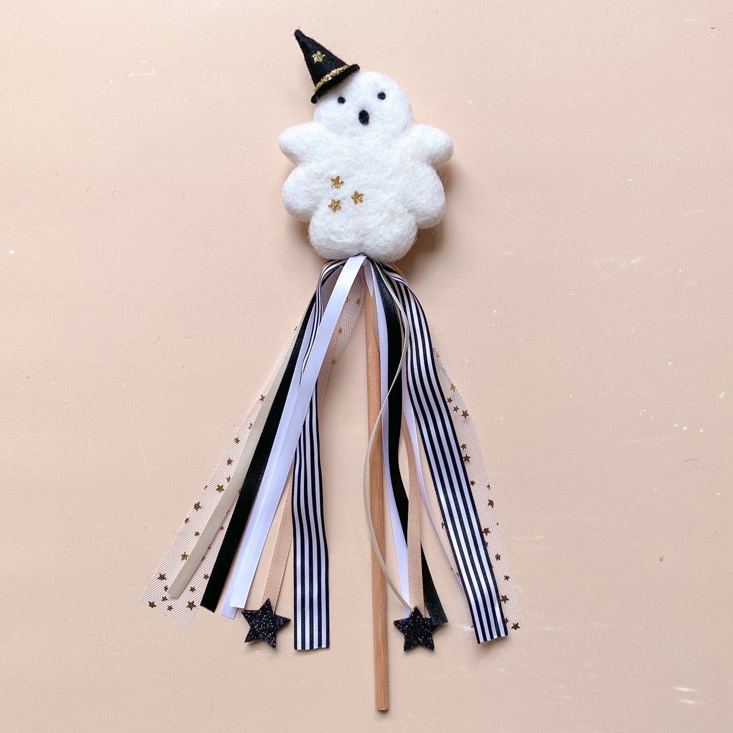 halloween ghost with black witch hat wand