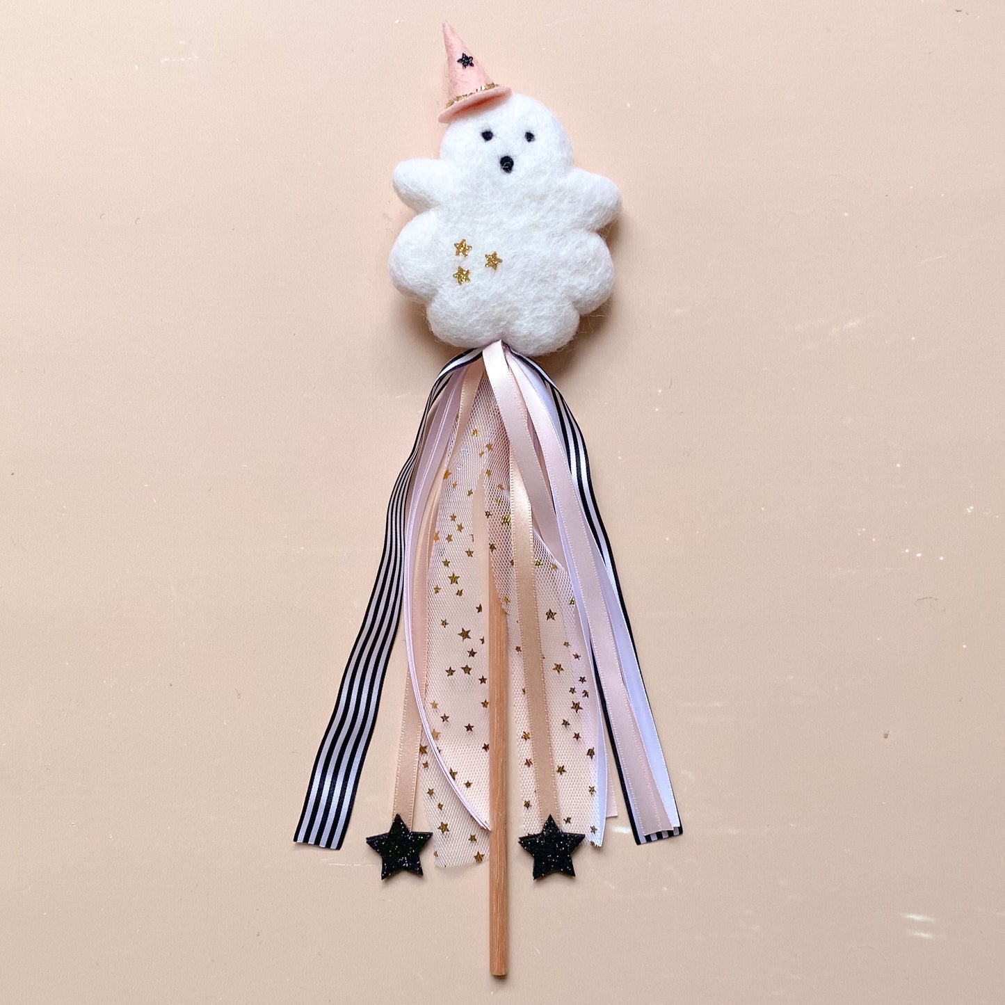 ghost with pink witch hat wand