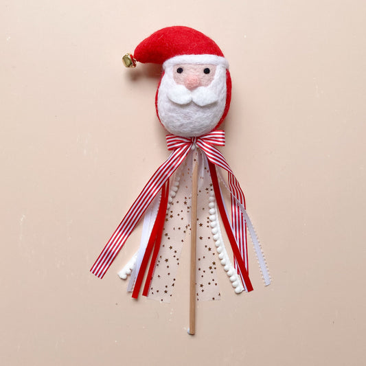 wool felted Santa with ribbon wand