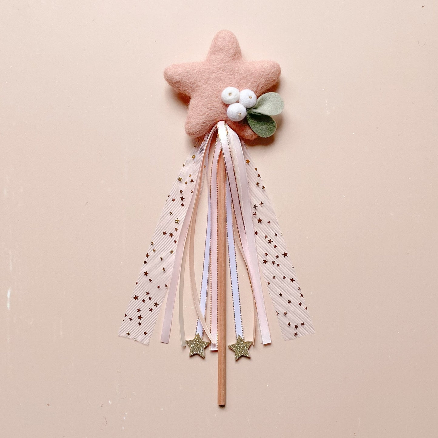 wool felted pink star shaped with mistletoe Christmas wand
