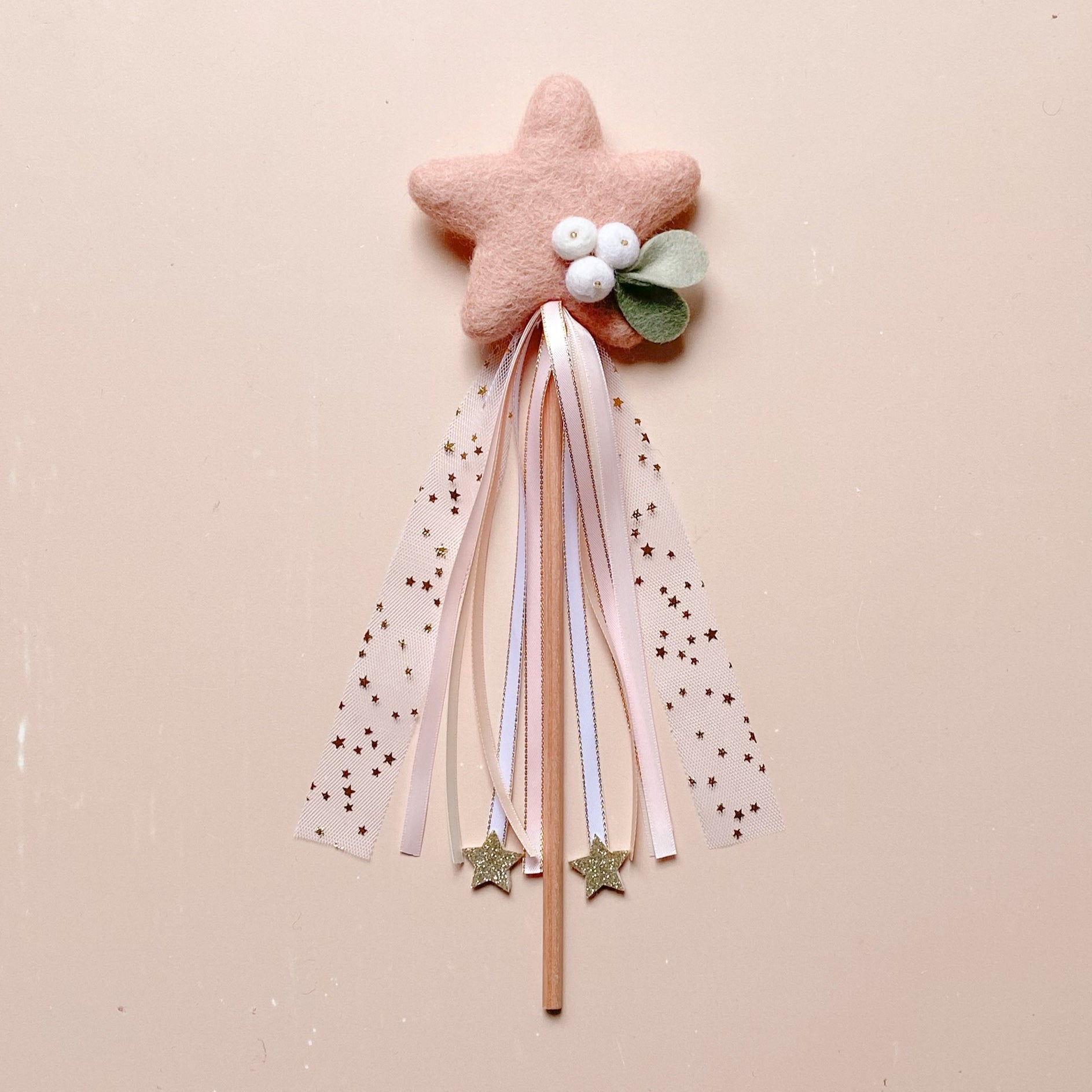 wool felted pink star shaped with mistletoe Christmas wand