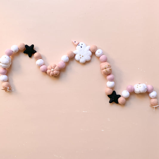 halloween felt garland with ghost, witch hat, pumpkins in soft pink colour
