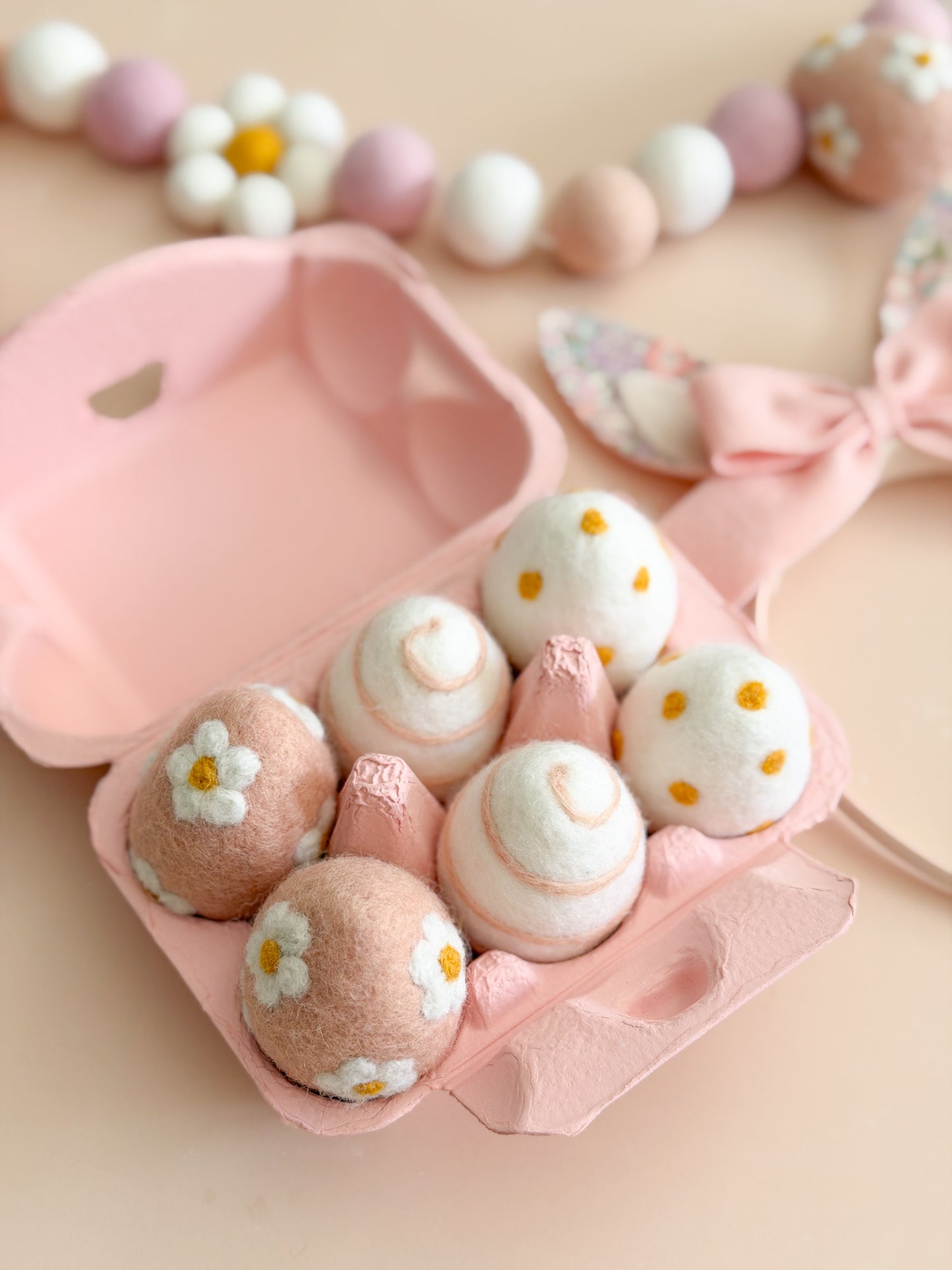 decorative wool felted eggs in egg carton