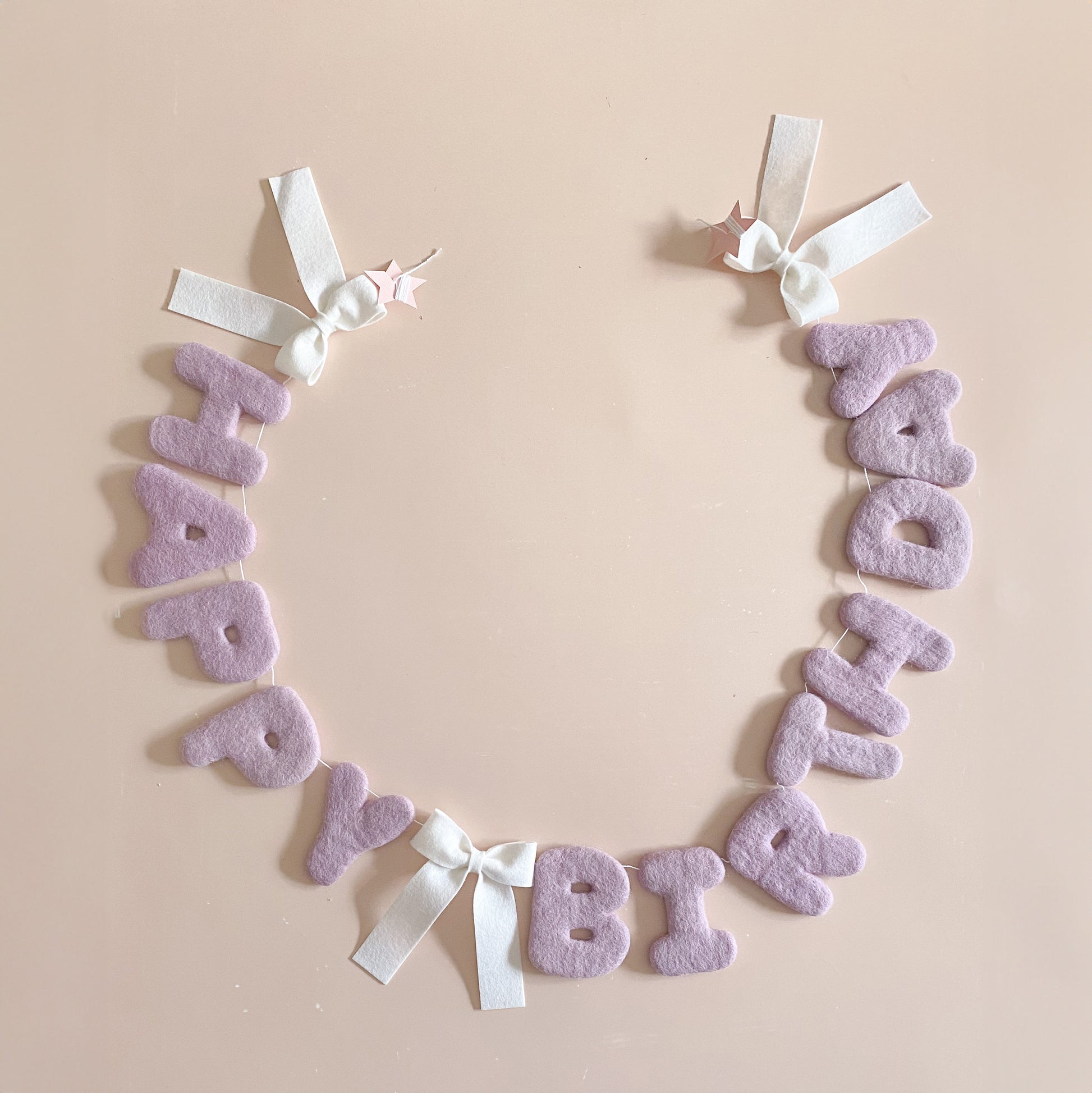 happy birthday letter garland with bow